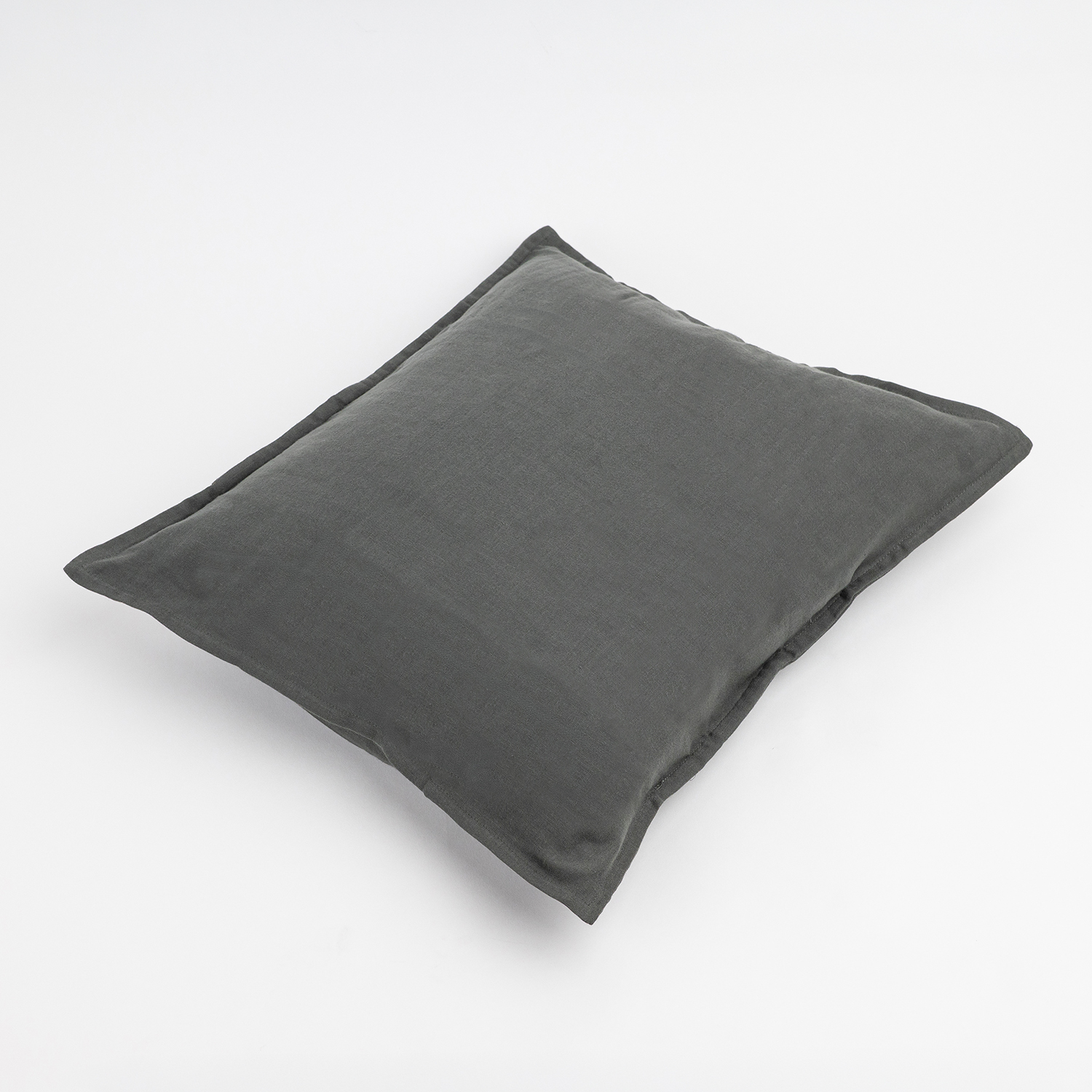 Grey pillow on a light background; filling not verified